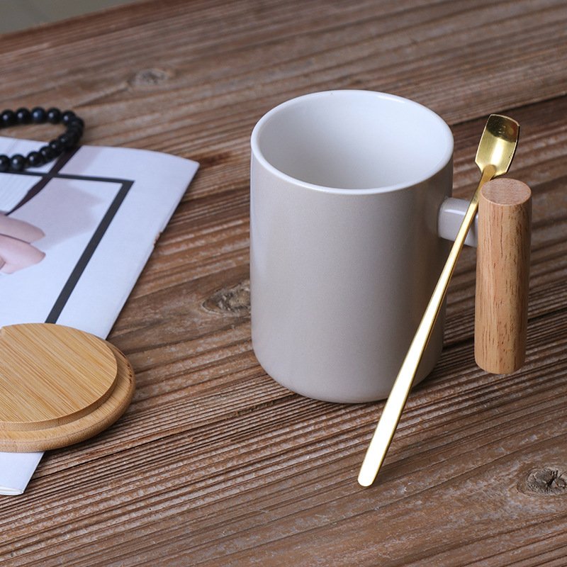 Top sale gift wooden handle porcelain coffee mug set custom logo nordic ceramic coffee mugs with bamboo lid and golden spoon