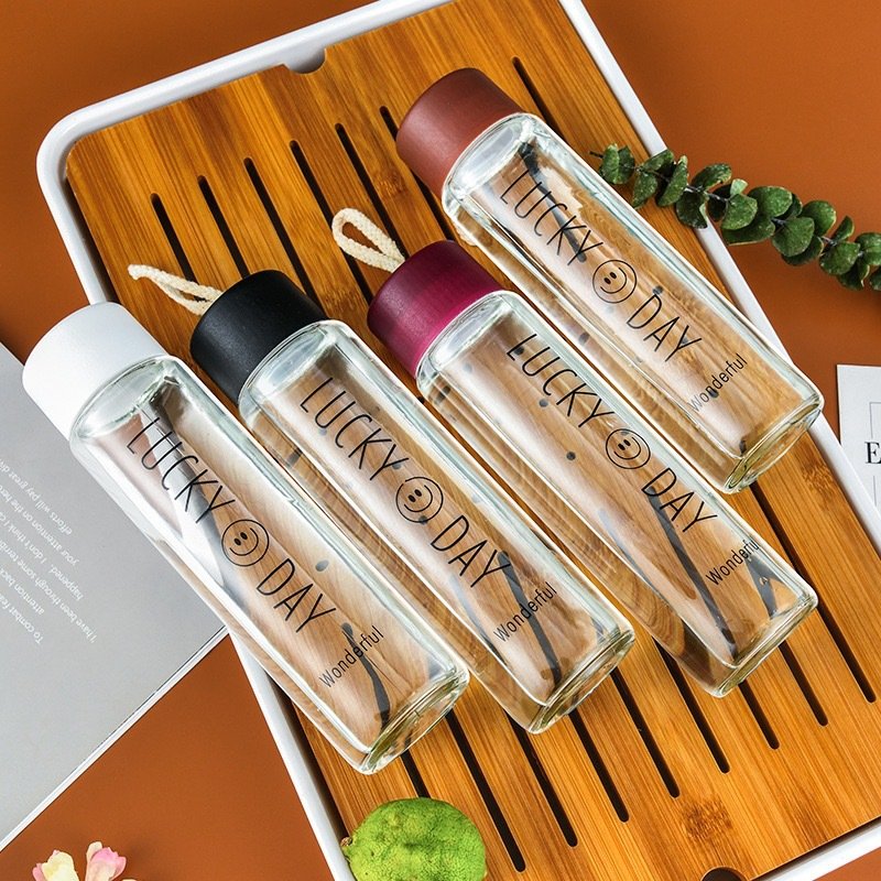 Customized Logo 400ml Capacity Adult Drinkware Smile Face Travel Sport Style Frosted Wholesale Glass Cups Water Bottle