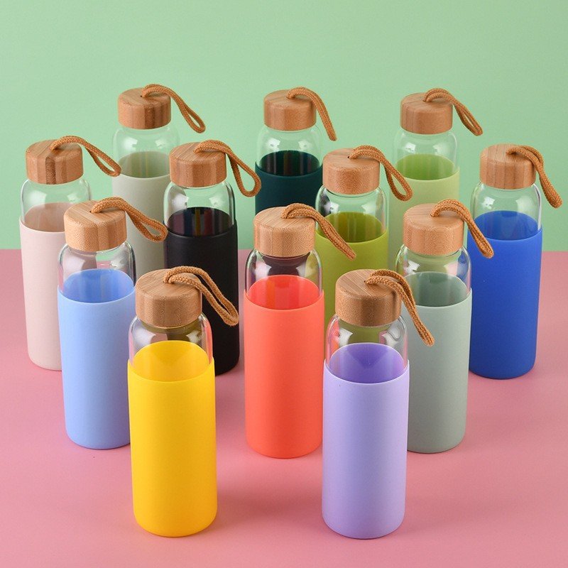 Hot Selling 20oz Borosilicate Drinkware tomatodo botella de agua Tumbler Glass Water Bottle With Silicone Sleeve Bamboo Lid