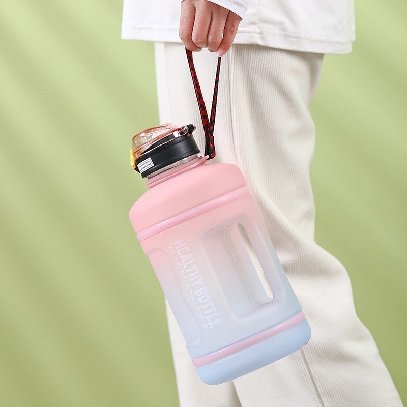 High quality 2200ml Motivational Reusable Water Bottles With Times To Drink BPA Free Frosted Plastic bottle with infuser