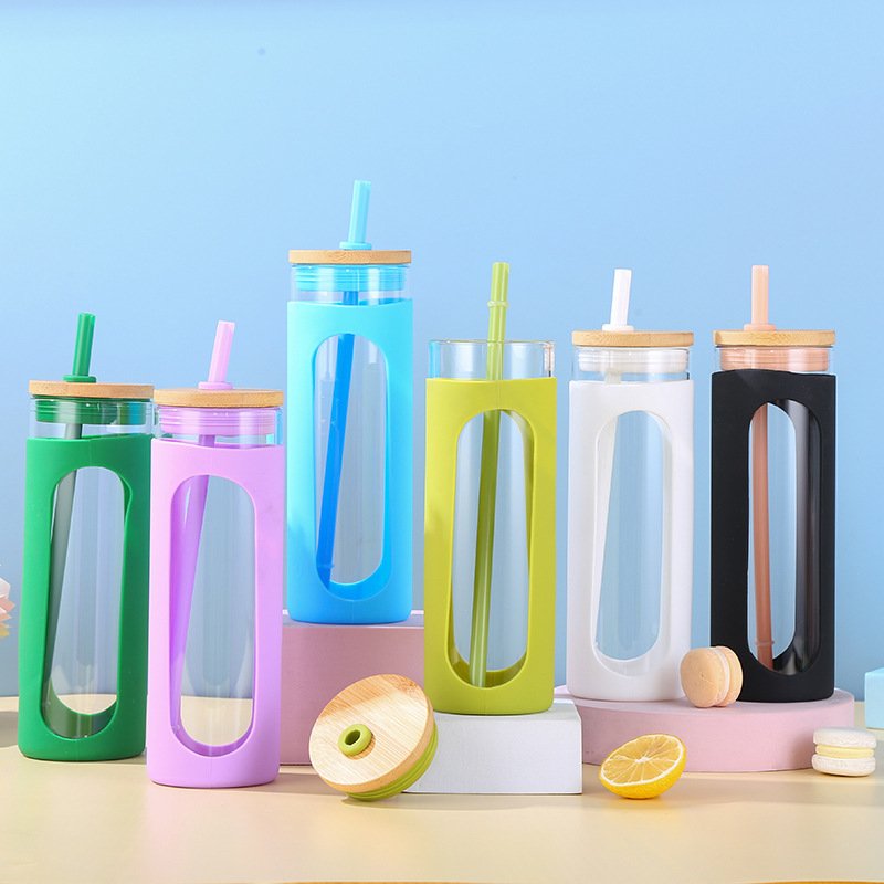 custom clear borosilicate glass water bottles glass coffee tumbler cups with silicone sleeve wood lid and straw