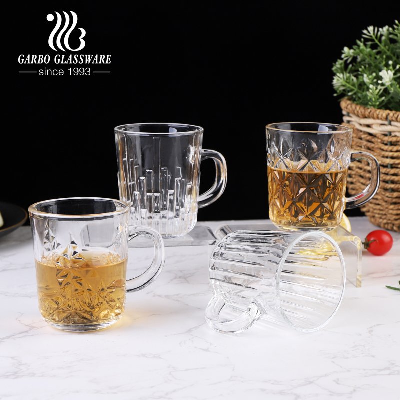 Wholesale popular machine made round transparent embossed 8oz glass mug with handle for tea coffee water