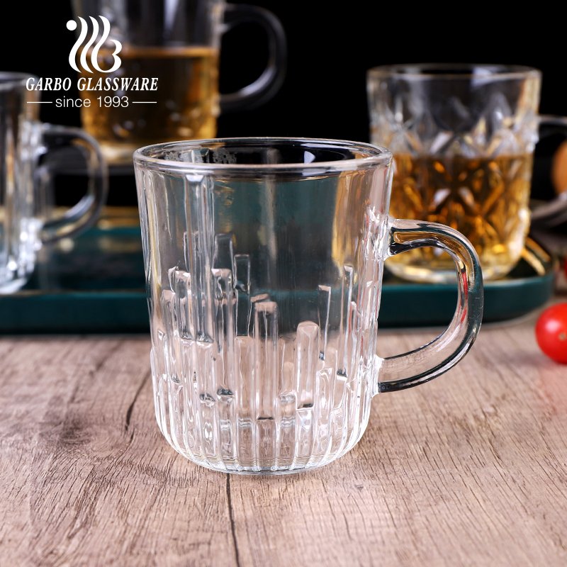 Wholesale popular machine made round transparent embossed 8oz glass mug with handle for tea coffee water