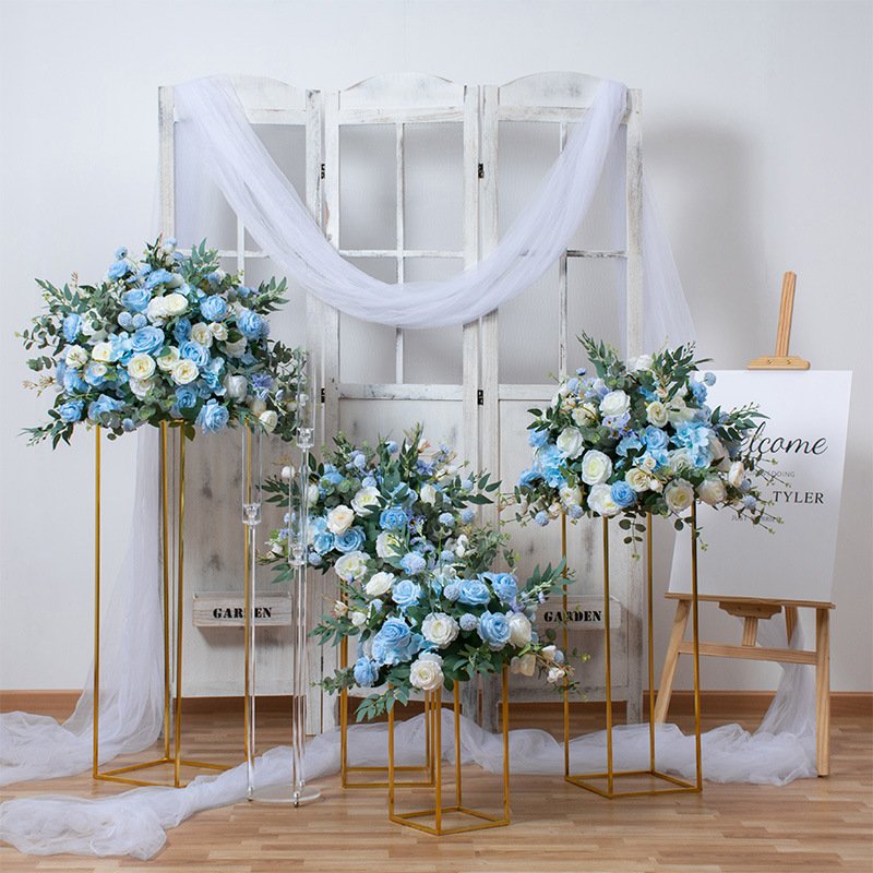Wedding and holiday events with simulated flower backgrounds flower walls and cake table decorations as well as fake flowers