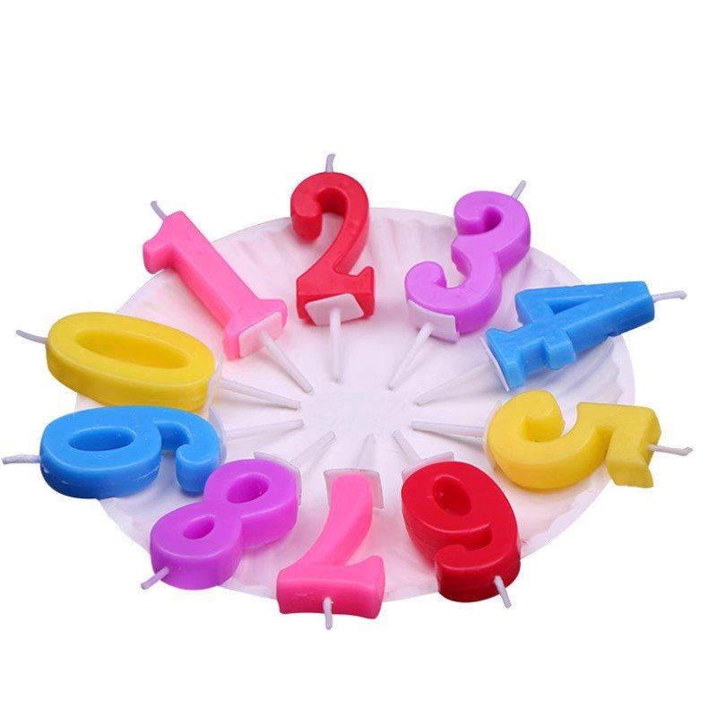 Colorful digital birthday candle individual package with base for birthday votive party cake with decorative baking supplies