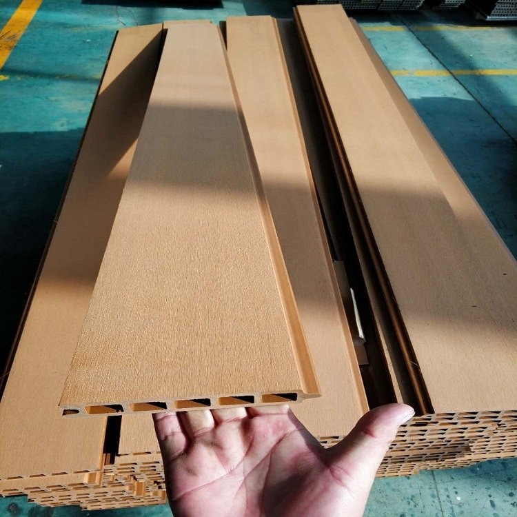 WPC hot-selling fence board water-proof anti-UV surface treatment wood grain smooth 3D embossed hollow square holes