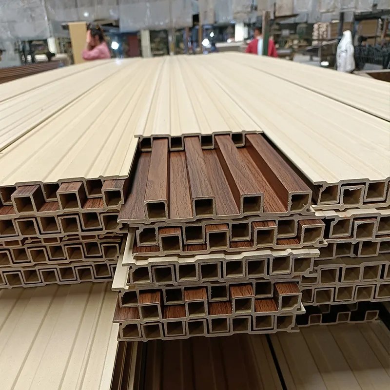 Waterproof wpc wall panel pvc film wood plastic wpc ceiling slat cladding fluted indoor wall panel for interior decoration
