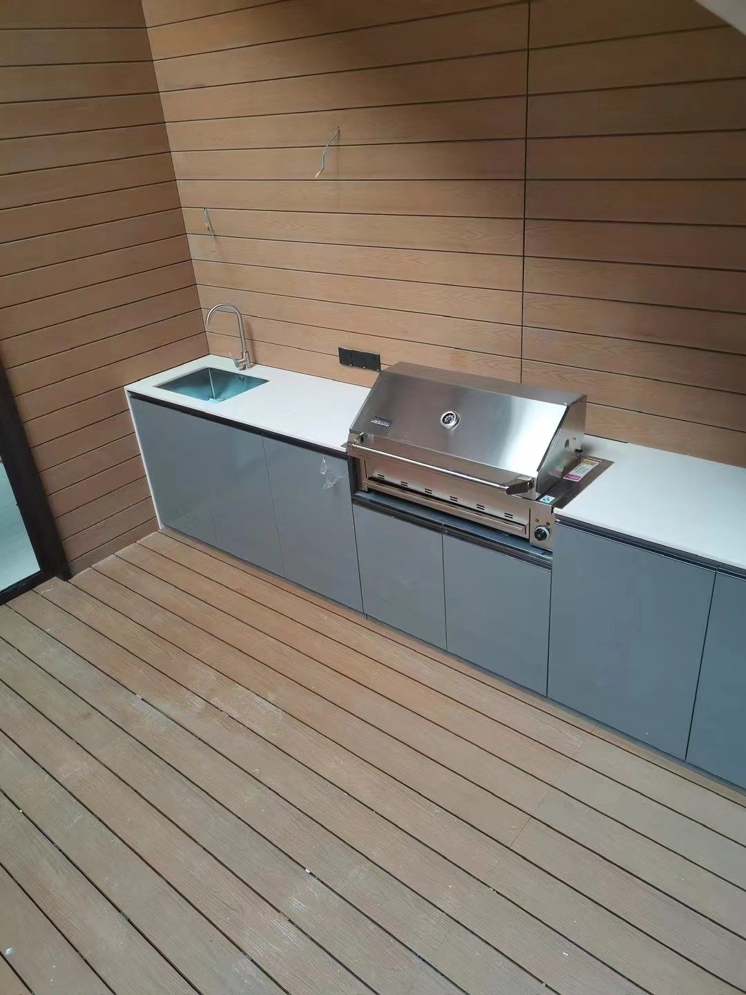 Modern aluminum outdoor kitchen cabinet with BBQ stove and sink and tap