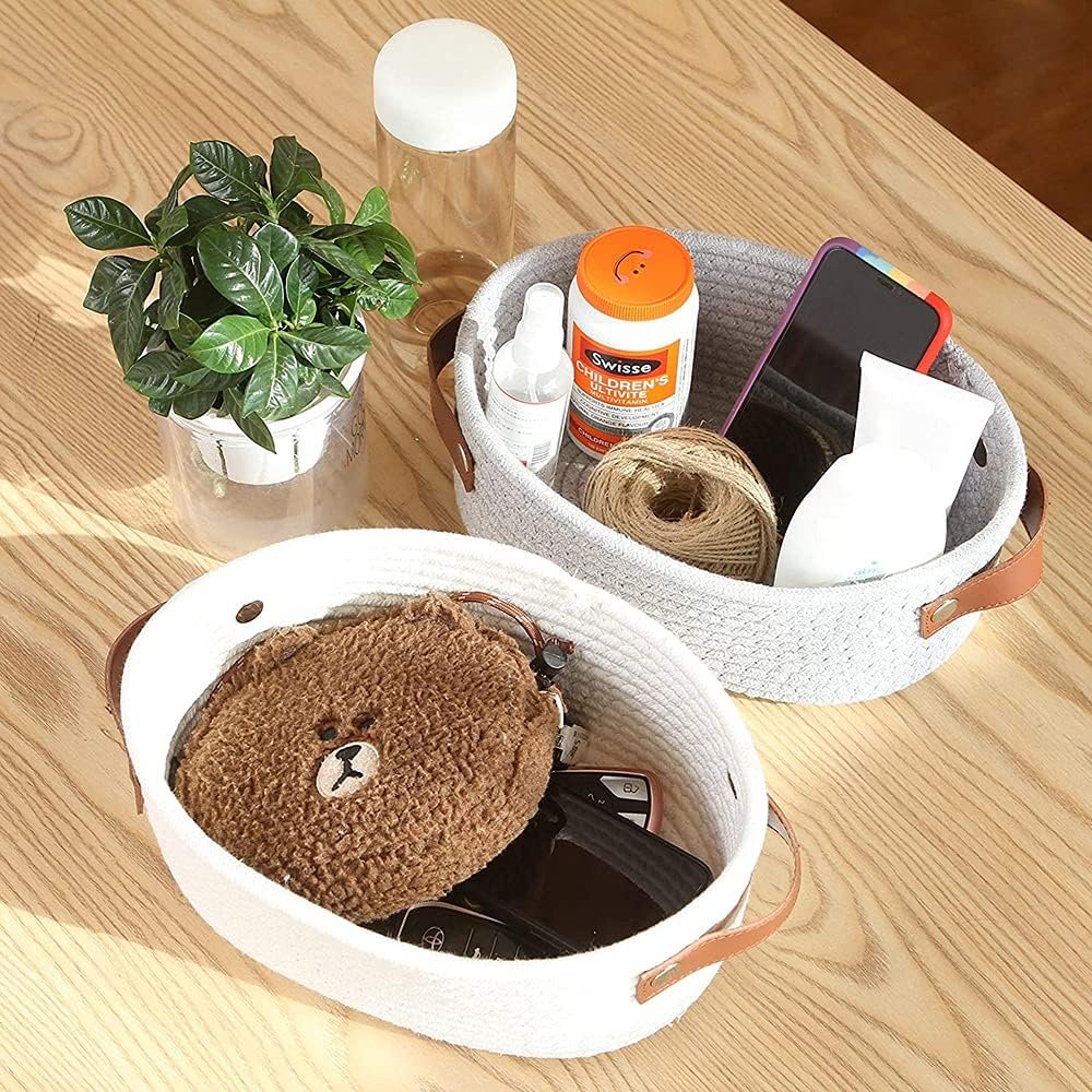 Cotton rope storage basket with leather handle, used for shelves, bedrooms, cabinets, wardrobes, drawers