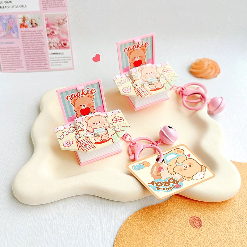 BC Cream Bear Surprise Book Keychain from the Cookie Bear Series Light Plastic Keychain with Gravure and Offset Printing