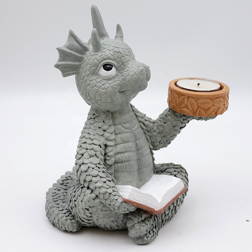 Custom wholesale resin craft decorative animal cute cartoon baby dragon sitting reading a book tea light candle holder
