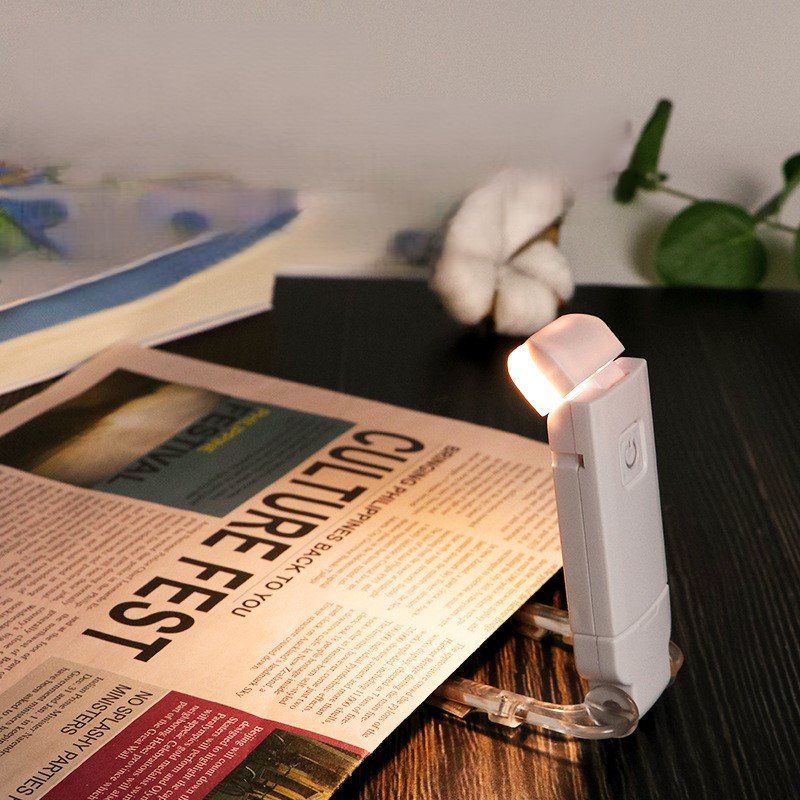 Adjustable Clip-On Mini LED Book Light Cheap Flexible Silicone Reading Lamp for Home and Bedroom Use with CR2032 Battery