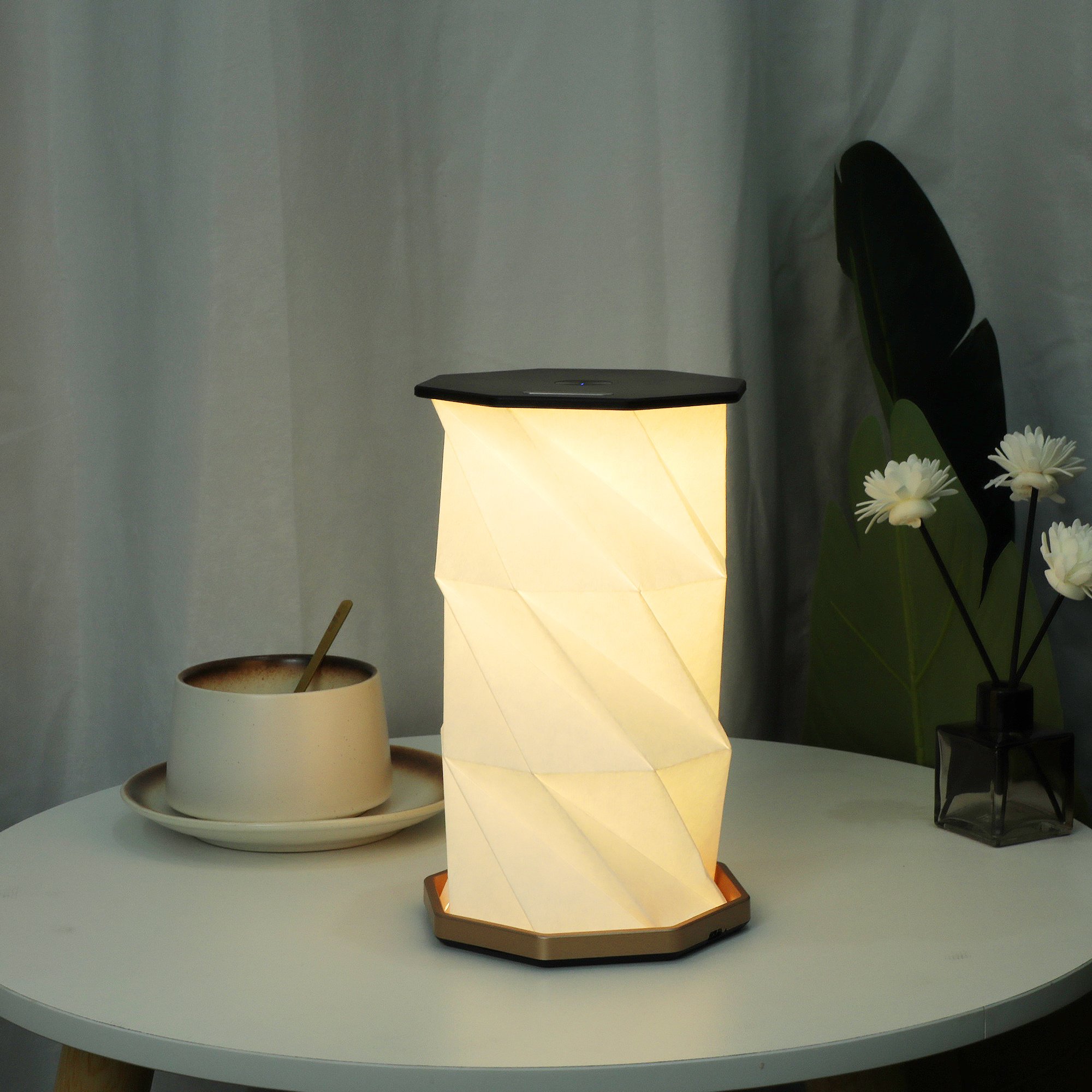 Portable Rechargeable Black Origami Book Night Light Adorned with Cubist-Inspired Graphics for Concert Hall