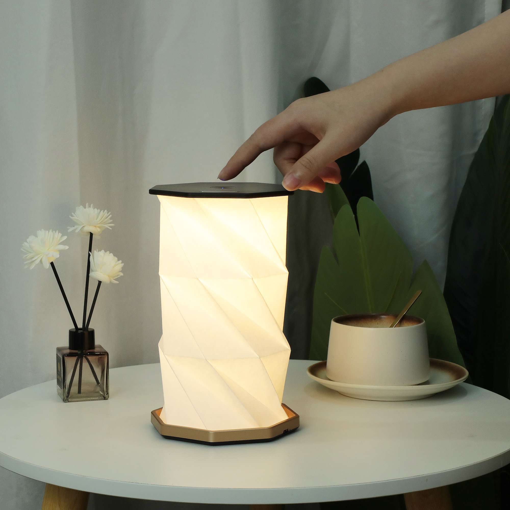Portable Rechargeable Black Origami Book Night Light Adorned with Cubist-Inspired Graphics for Concert Hall