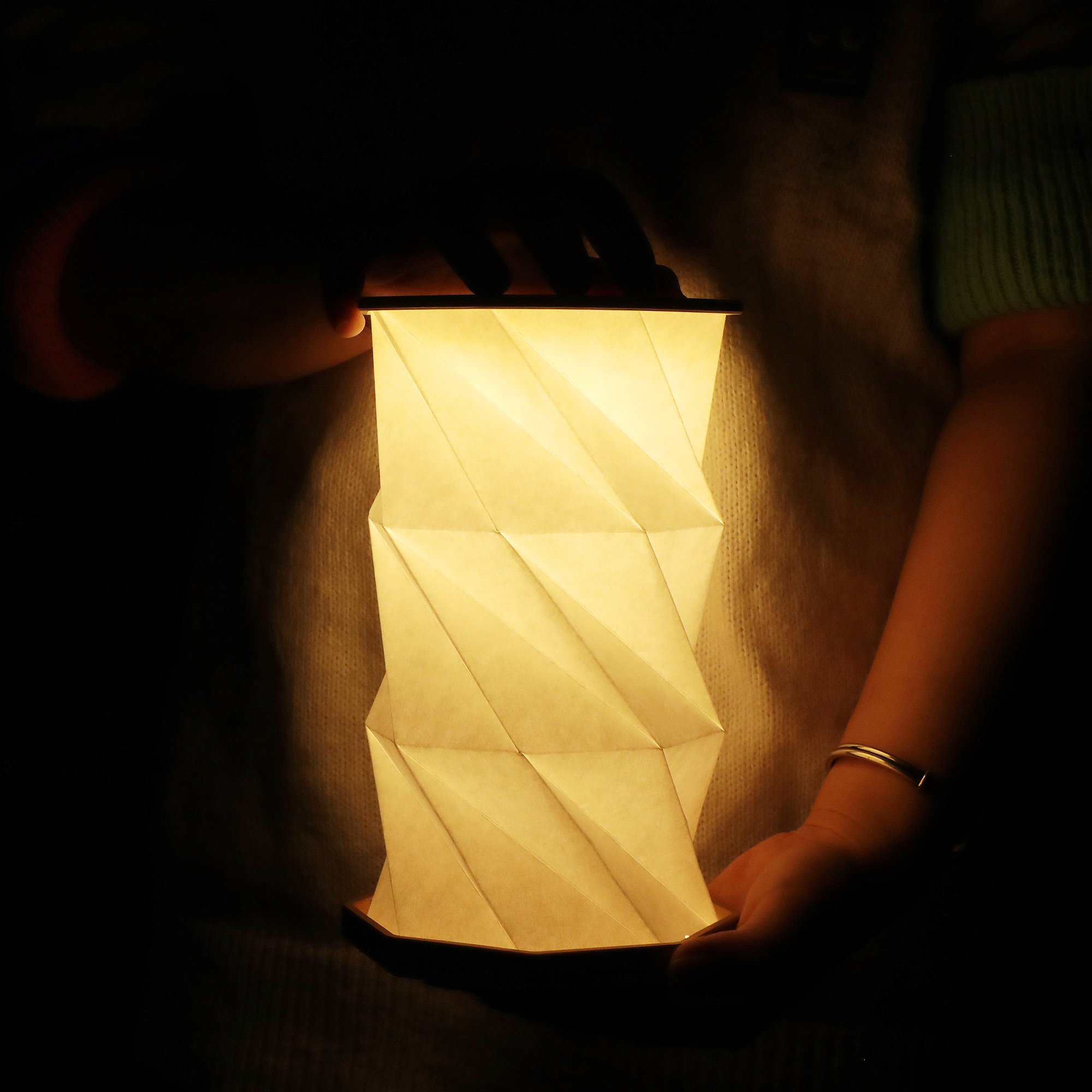 Portable Rechargeable Black Origami Book Night Light Adorned with Cubist-Inspired Graphics for Concert Hall