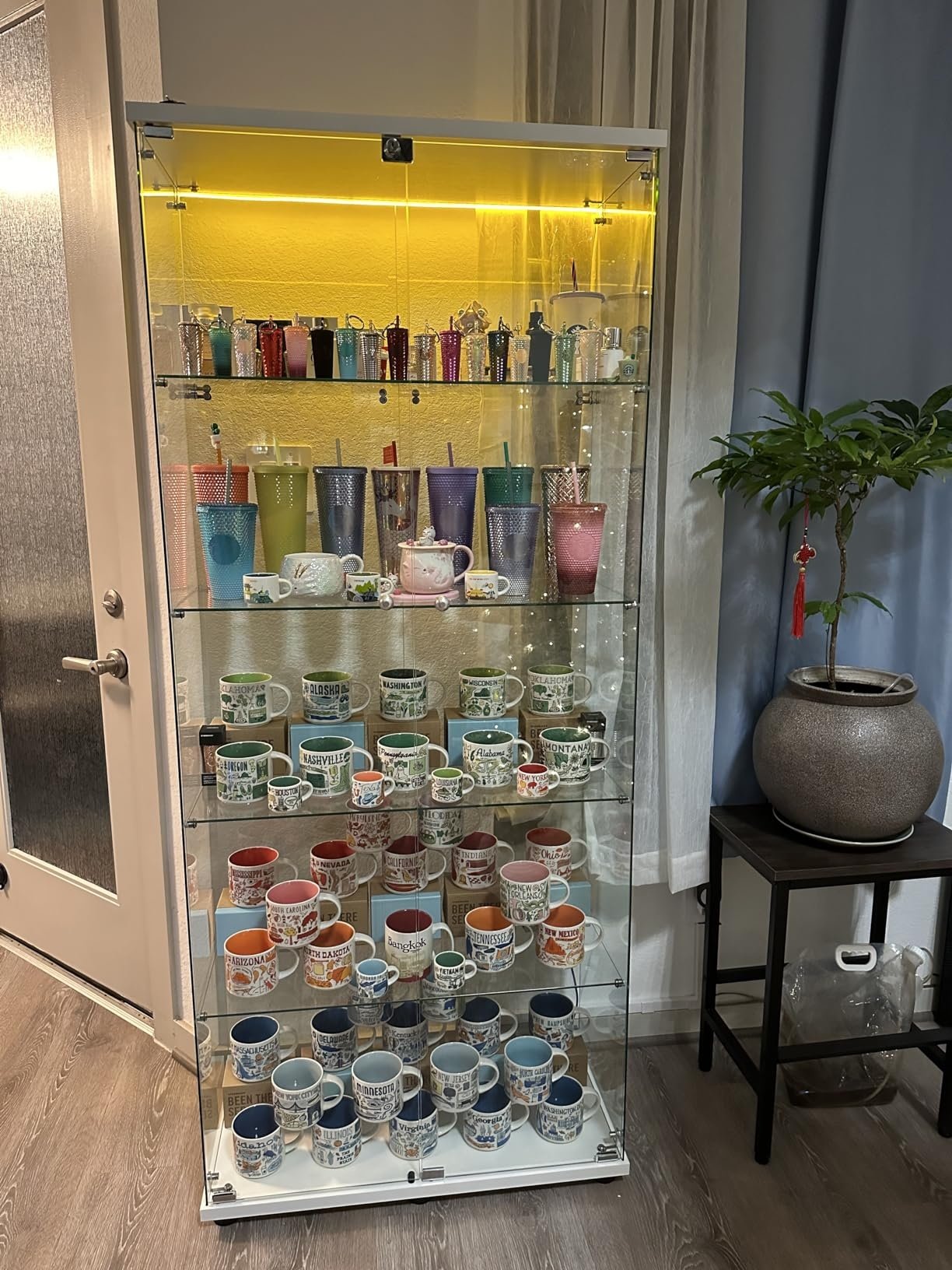 Customized led light showcase design aluminium glass display stand floor standing glass cabinet for book toy curio living room