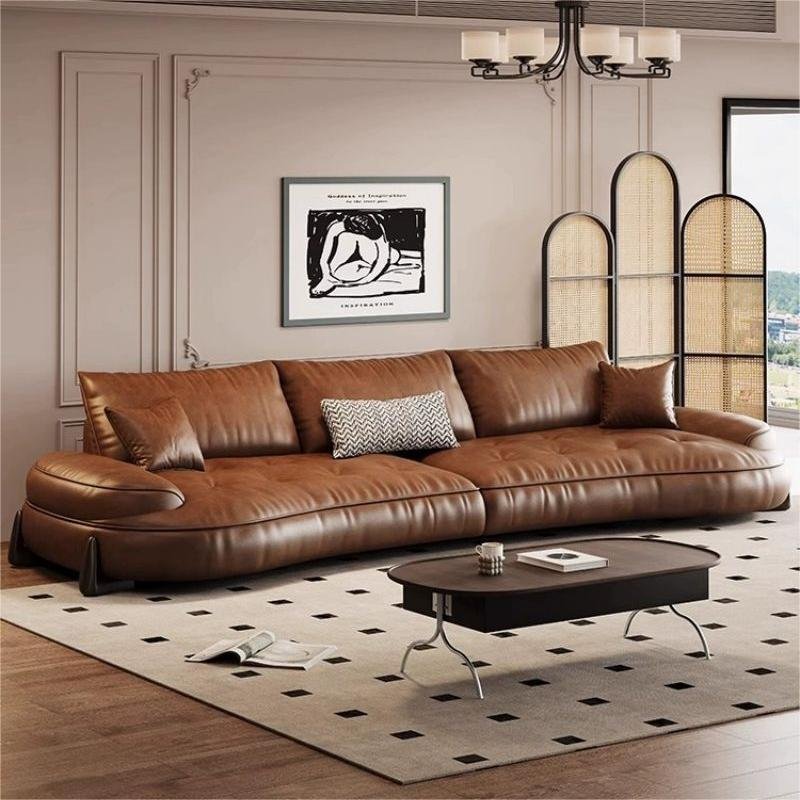 Italian minimalist leather sofa with curved retro top layer cowhide living room, modern and minimalist designer sofa combination