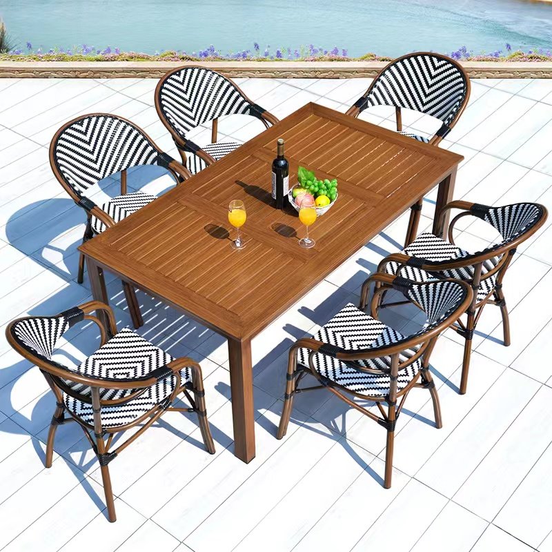 High Quality Outdoor Dining Table and Chairs Leisure Restaurant Table Sets 4 Pe Rattan Armrest Chairs and Aluminum Table