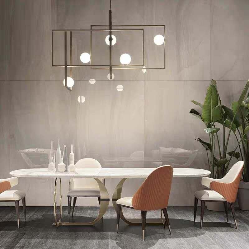 Modern stainless steel dining table with golden pedestal Custom luxury dining room furniture