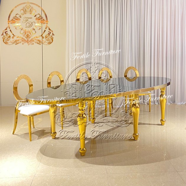 New Model Modern Wedding Event Stainless Steel Frame Mirror Glass Top Oval Shape Dining Table With Chair Set