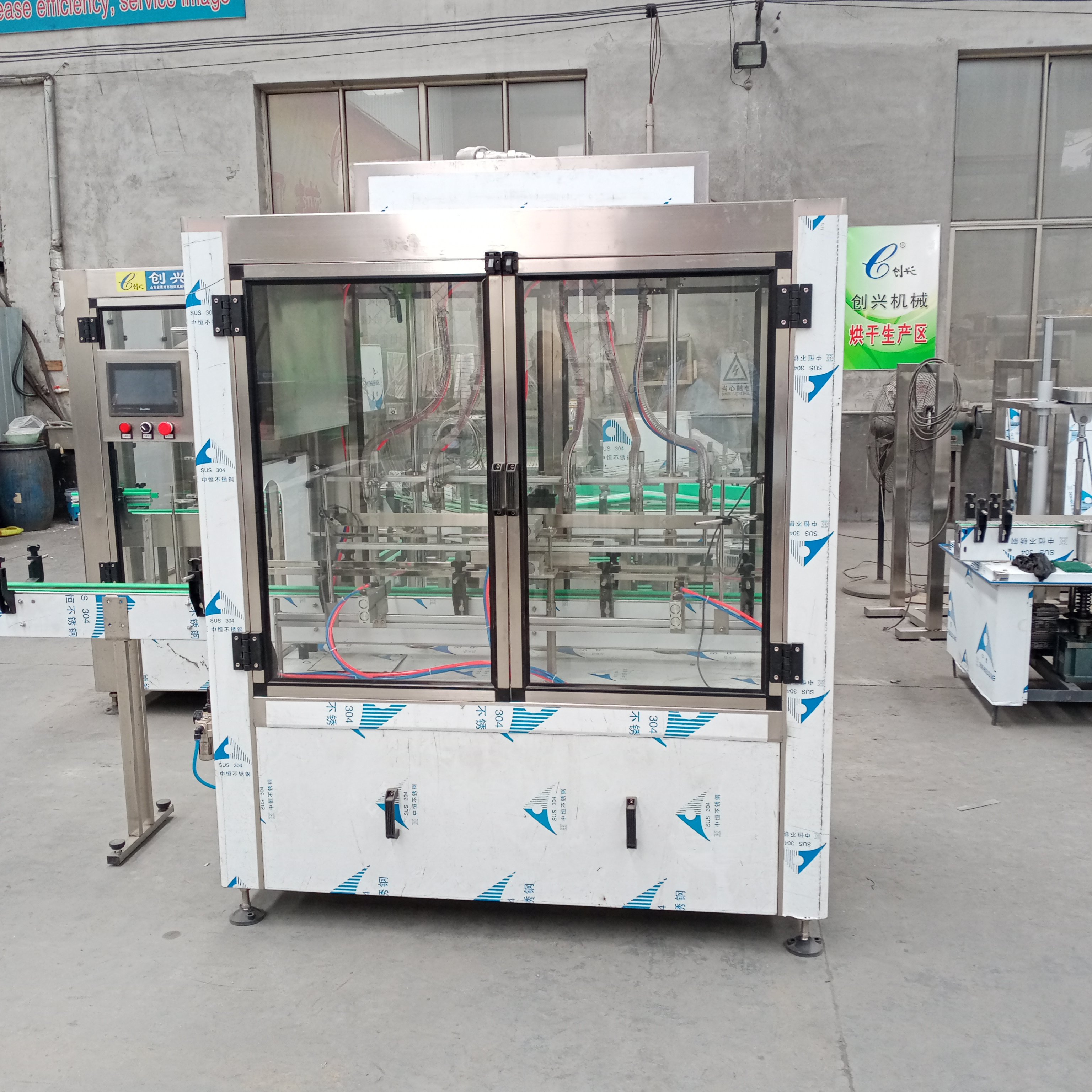 Full Automatic Linear Liquid Filler Water Soy Sauce Juice Gin Wine Vodka Bottle Pressure Overflow Filling Machine