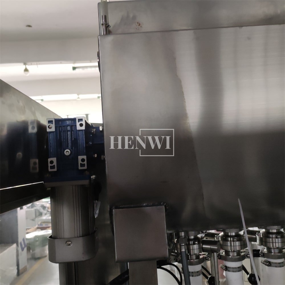 Henwi 4 Nozzles Constant Temperature Filler Automatic Paraffin Wax Vaseline Cream Candle Gel Heating Mixing Hot Filling Machine