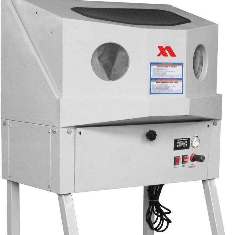 Enclosed parts washer with auxiliary heating system