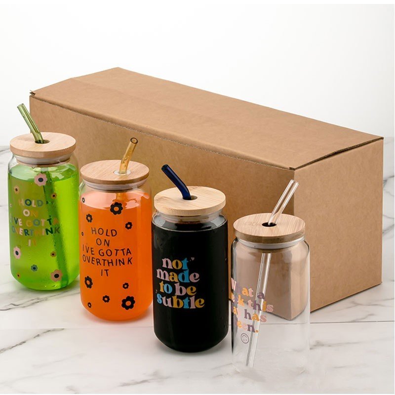 Hot sale 12oz 16oz transparent beer can sublimation glass cola bottle with bamboo cover and glass straw