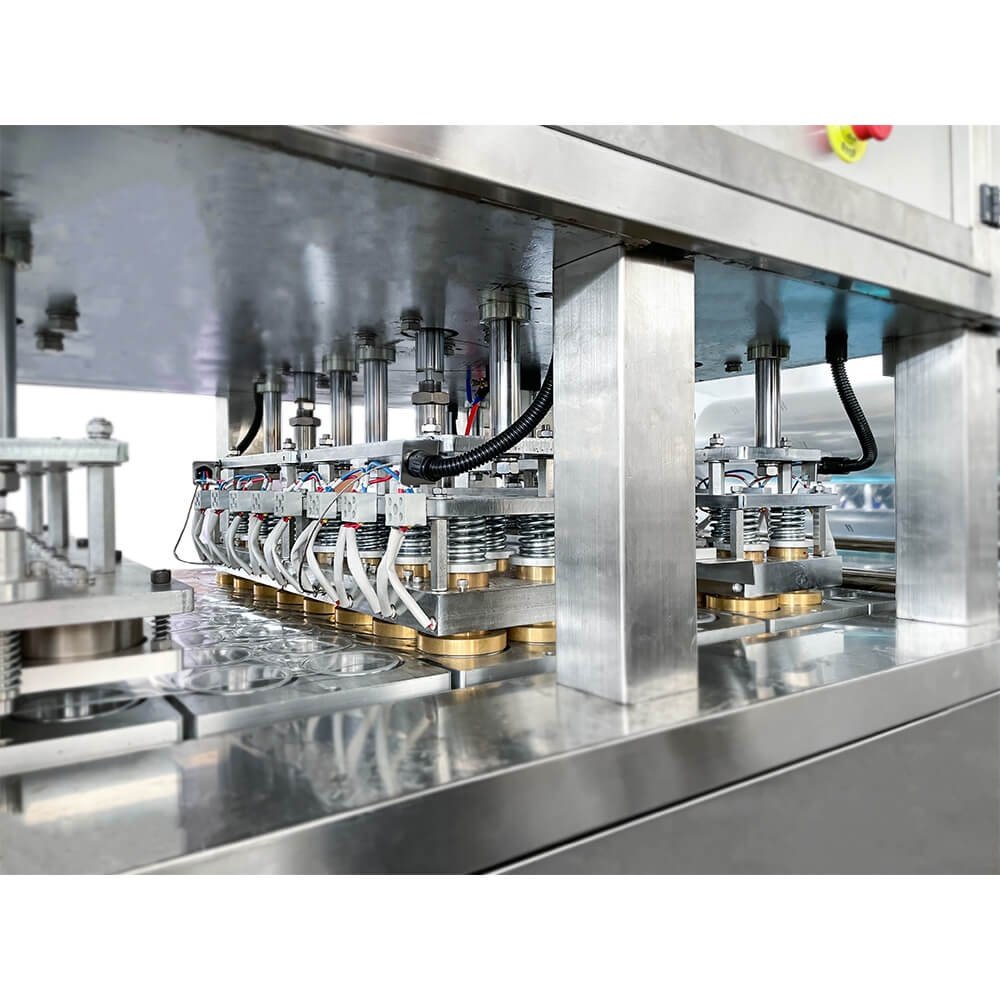 Stand cup filling and capping equipment for food industry