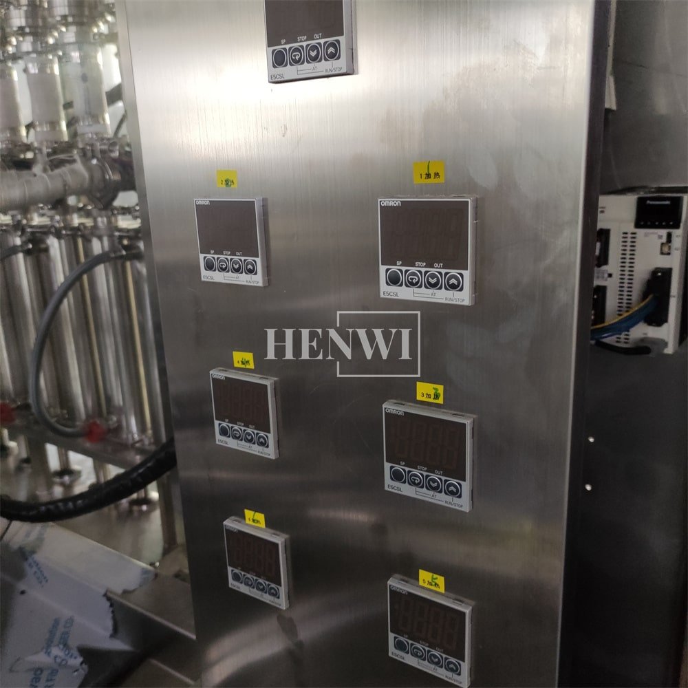 Henwi 10 Nozzles Constant Temperature Filler Automatic High Viscous Paste Petroleum Jelly Candle Wax Gel Heating Filling Machine