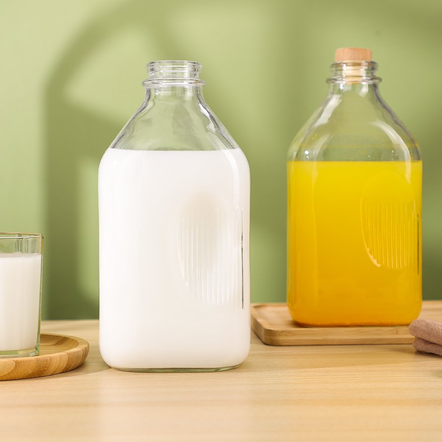 Ergonomically designed large capacity square empty 2000ml drinkware beverage cold juice milk glass bottle for packaging