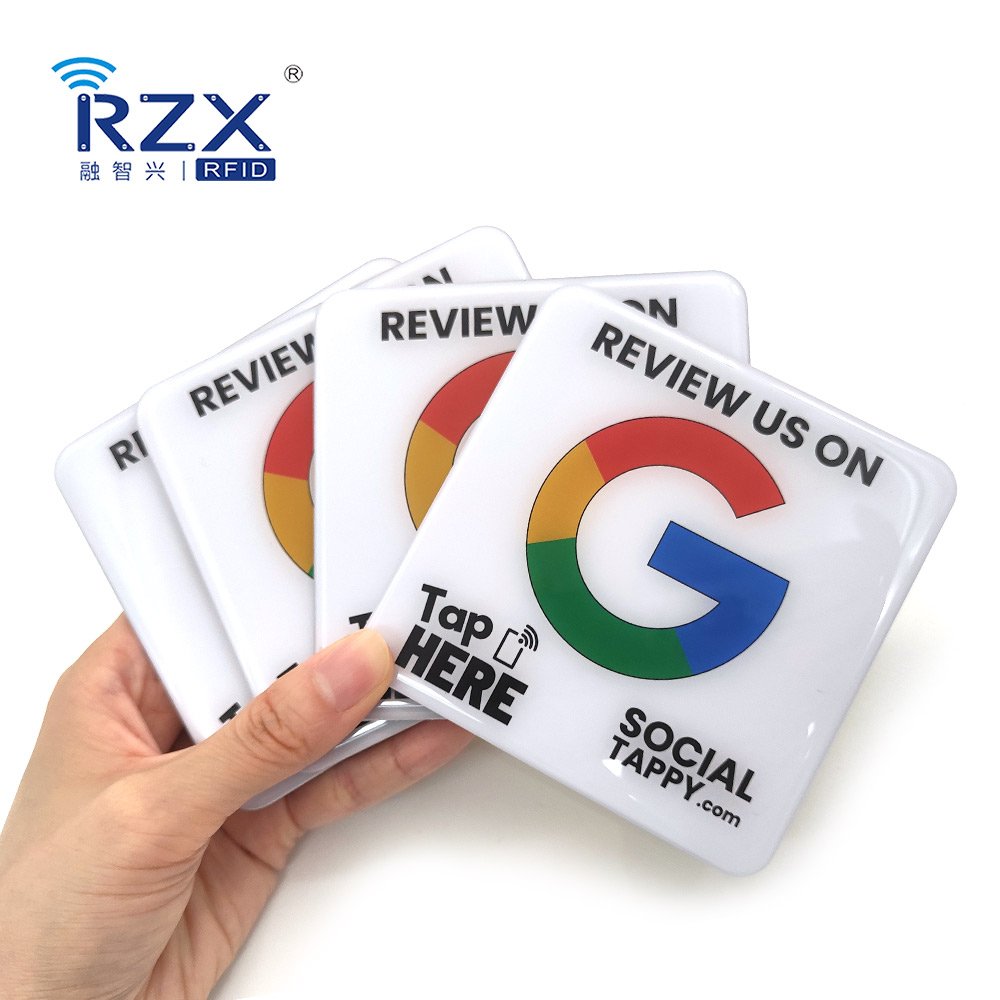 RZX customized printing 50*30mm Programmable 13.56mhz RFID NFC Epoxy key tags smart cards