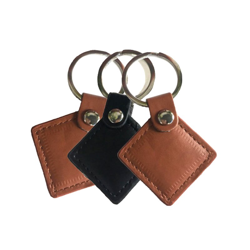 XRH Rfid 13.56Mhz embossed customized logo nfc tag leather keychain RFID tag for hotel