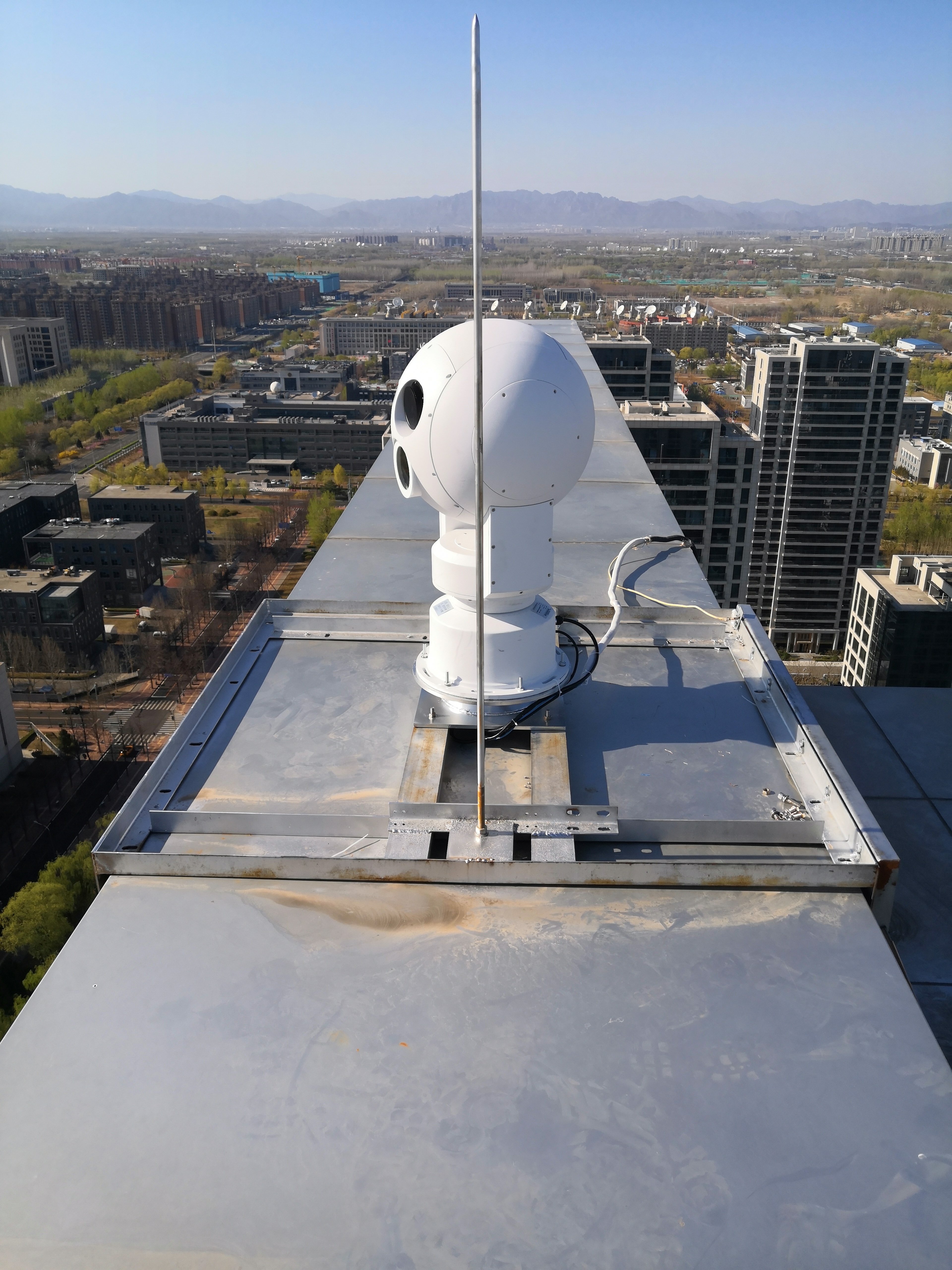 Telephoto surveillance camera, border security monitoring system at border ports