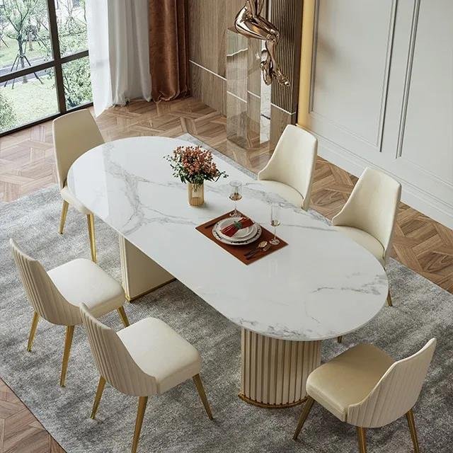Light luxury marble dining table and chair combination home simple post-modern small apartment slate Nordic oval dining table