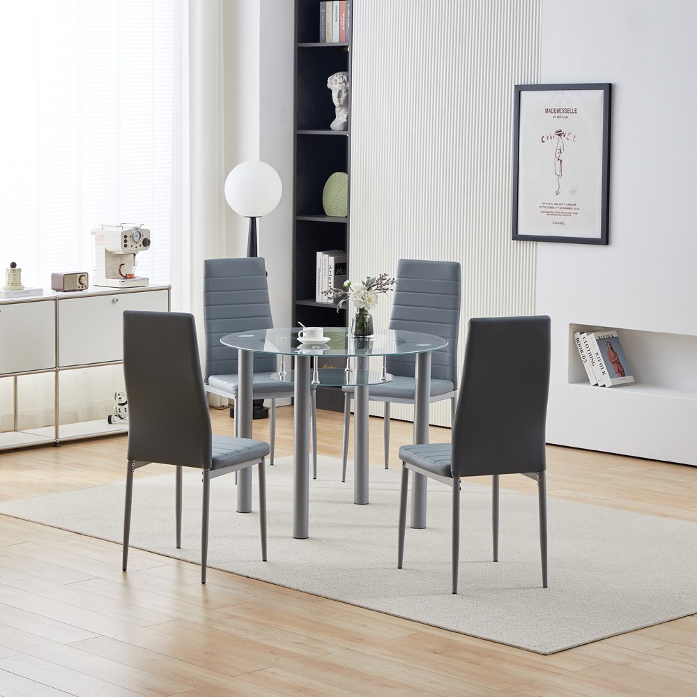 Glass Top Dining Table Made Of Metal With Grey Tone Round Table Has Straight Legs And Shelf Storage Or Displaying Decorative