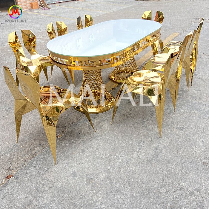 Fashionable Luxury Oval Shape Gold Stainless Steel Dinning Table With Chairs Set