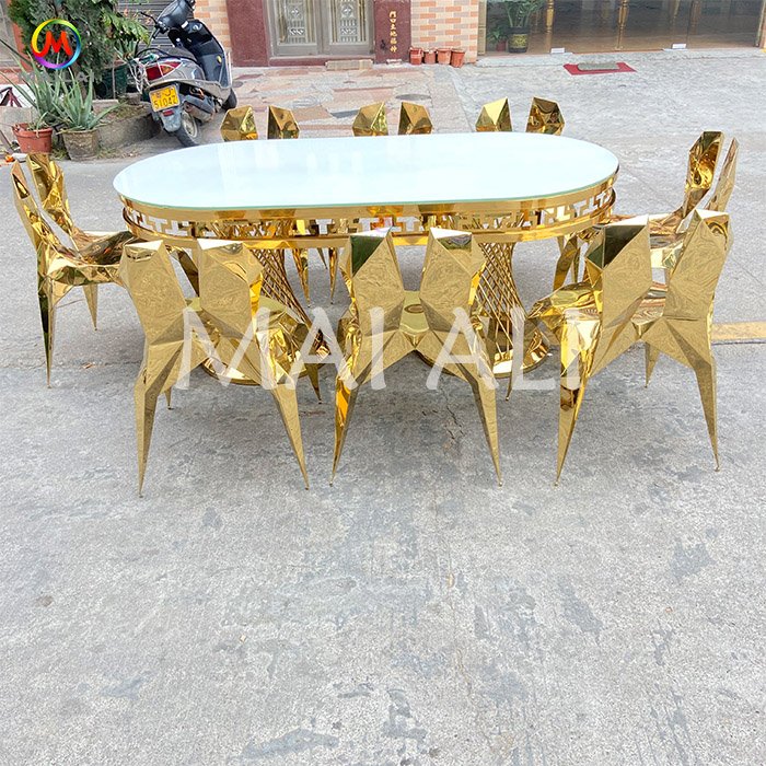 Fashionable Luxury Oval Shape Gold Stainless Steel Dinning Table With Chairs Set