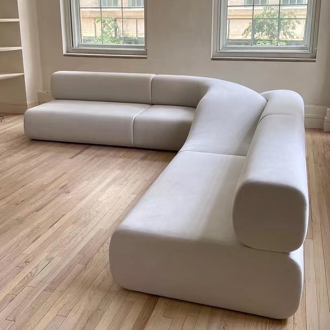 Designer special-shaped creative office leisure corner against the wall corner long irregular twist shape store sofa