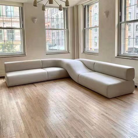 Designer special-shaped creative office leisure corner against the wall corner long irregular twist shape store sofa