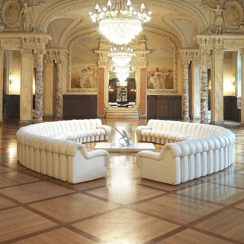 ATUNUS Italian Cool Black Leather Snake Curved Sofa Unique Hotel Office Furniture Modular Sectional Sofa Couch Set
