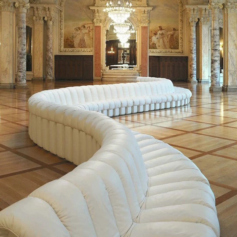 ATUNUS Italian Cool Black Leather Snake Curved Sofa Unique Hotel Office Furniture Modular Sectional Sofa Couch Set