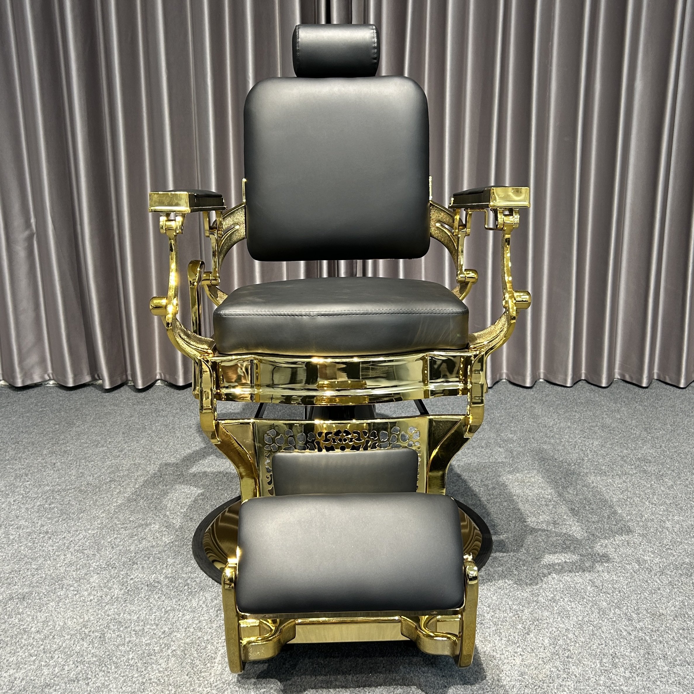 Heavy-duty black and gold barber chairs with hydraulic systems modern styling chair salons using faux leather materials