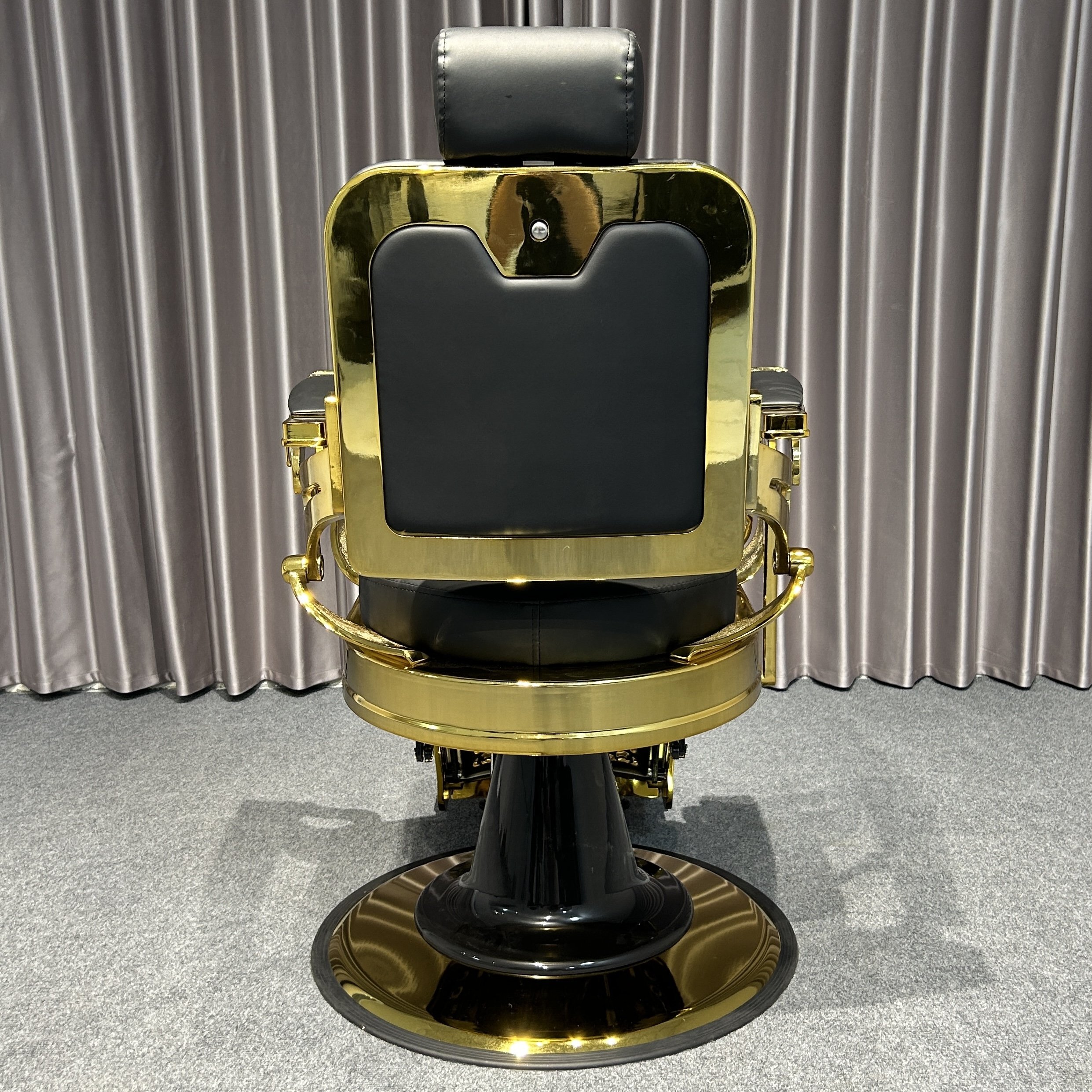 Heavy-duty black and gold barber chairs with hydraulic systems modern styling chair salons using faux leather materials