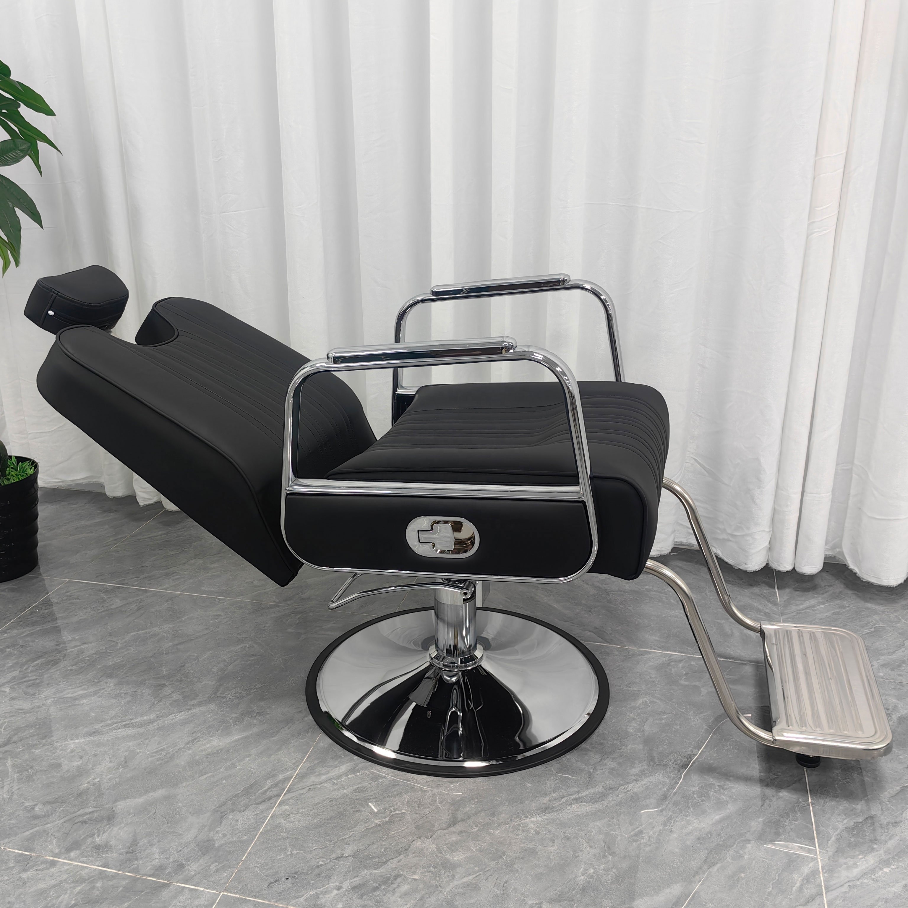 Chinese professional barber chair hydraulic salon chair recliner manufacturer with foldable backrest