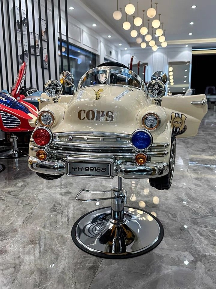 Jincheng children's barber chair beauty salon furniture cartoon chair car hydraulic children's haircut chair.