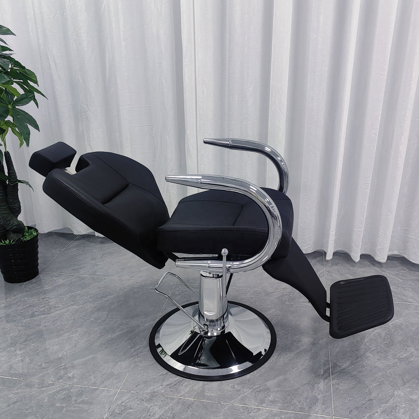 Chinese professional barber chair hydraulic salon chair recliner manufacturer with foldable backrest wholesale