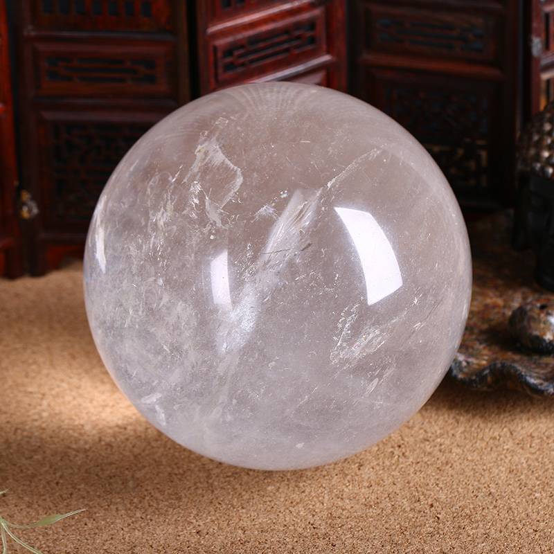 Natural white ornament rough supports identification crystal ball