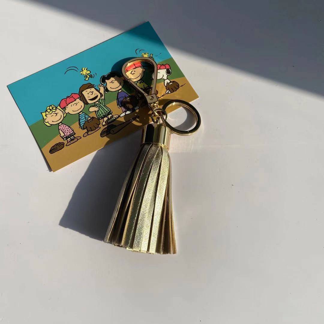 Exit end of the single gold streaming keychain bag hanging decoration pendant