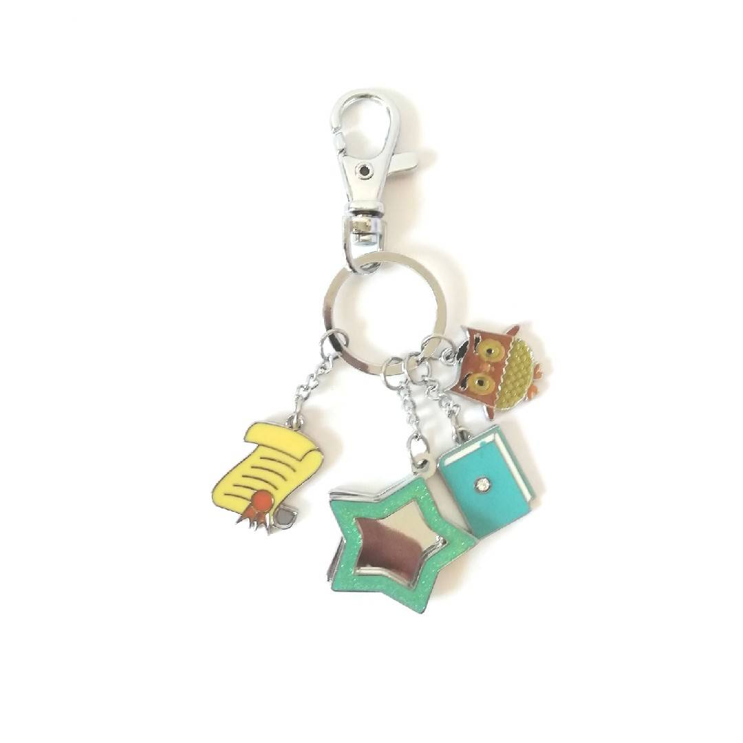 Graduate accessories can be placed on keychain to send classmates and friends